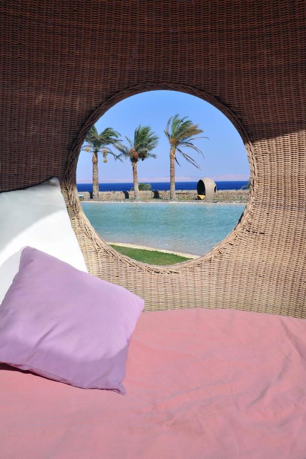 Retac Qunay Dahab Resort & Spa Luaran gambar View of the pool at the hotel